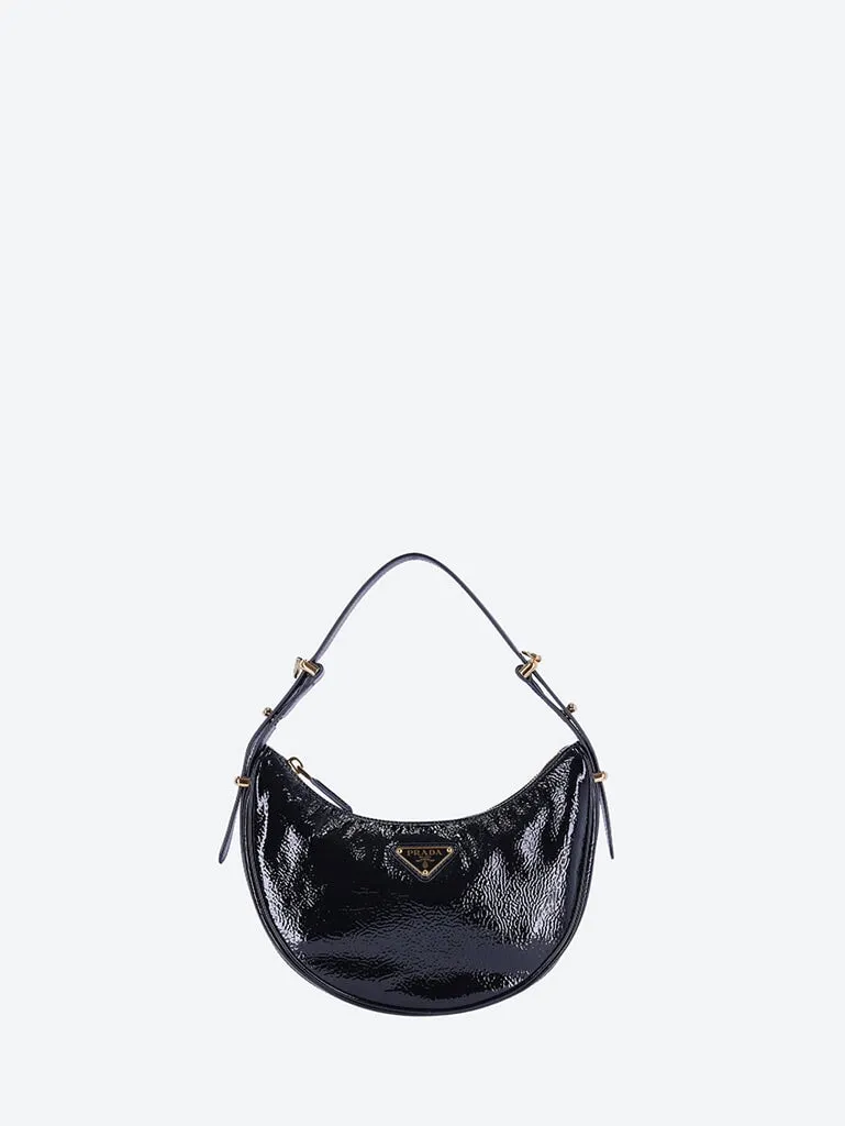 Leather arqué patent handbag